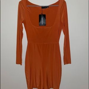 Orange autumn colored romper. Extremely soft, never worn. Size 10 (M-L)